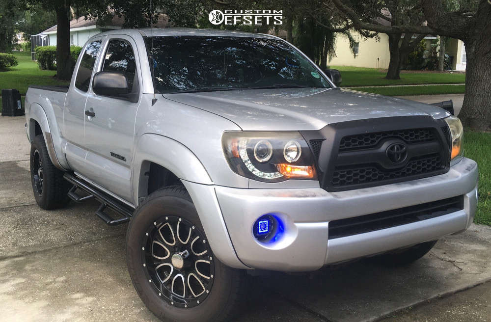 2011 Toyota Tacoma with 18x9 -12 Helo He879 and 265/65R18 Michelin ...