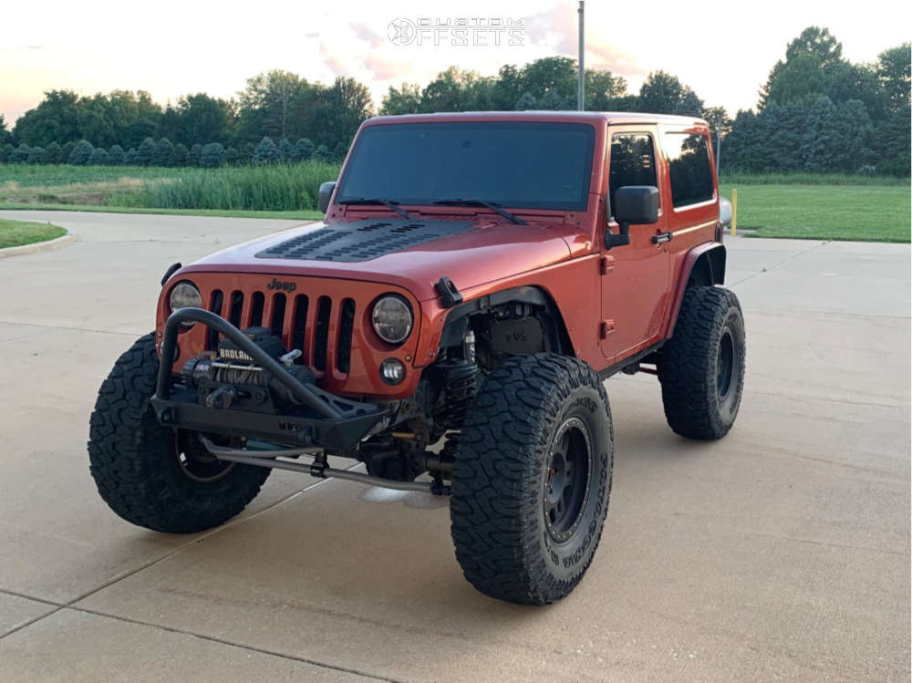2009 Jeep Wrangler with 17x8.5 Vision Manx and 38/13.5R17 Milestar