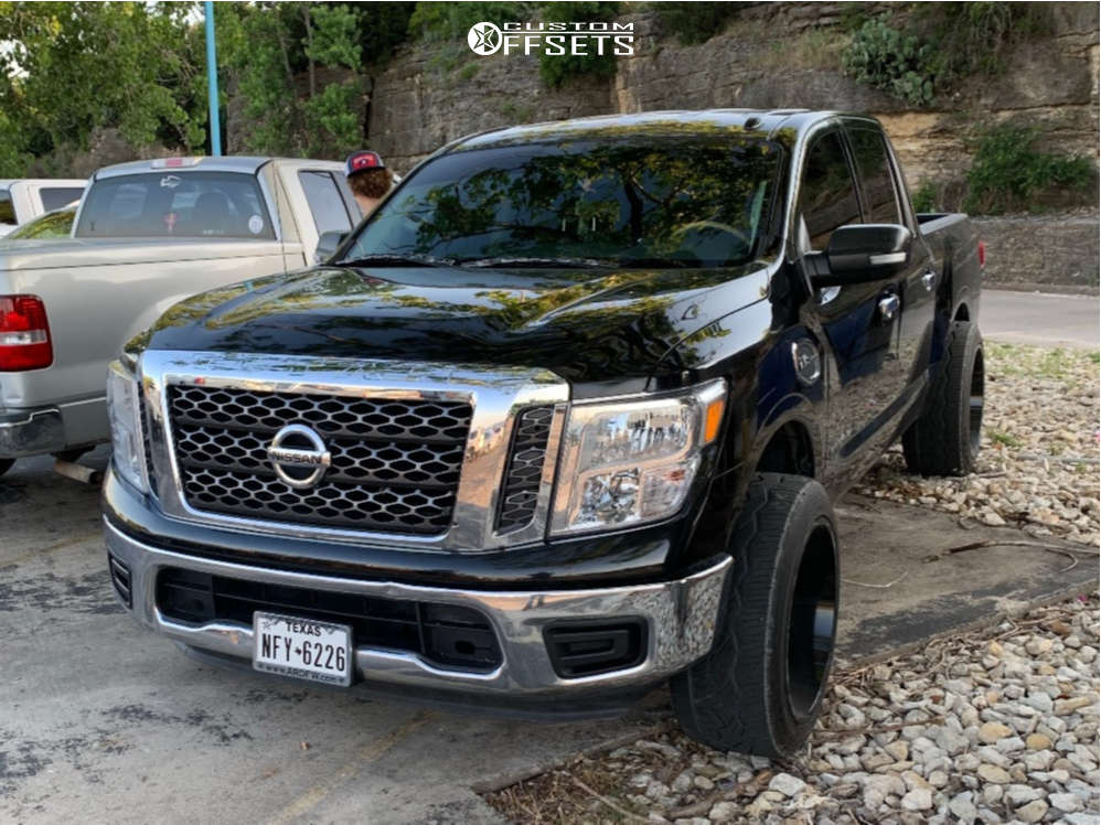 2017 Nissan Titan with 22x12 44 Hostile Jigsaw and 33/12.5R22 Nitto