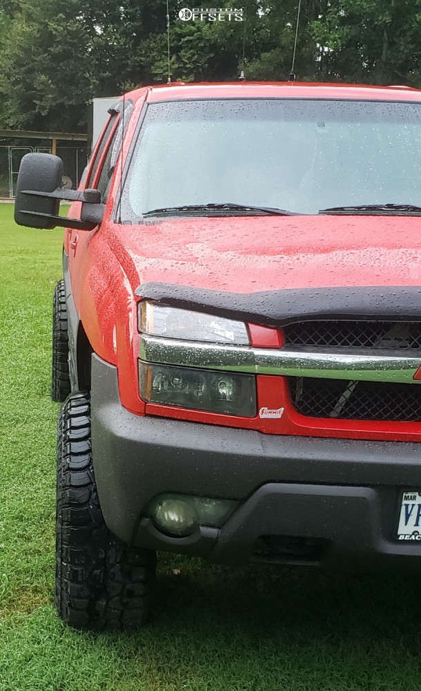 2003 Chevrolet Avalanche 1500 with 20x12 44 Ultra Xtreme X111 and 35/