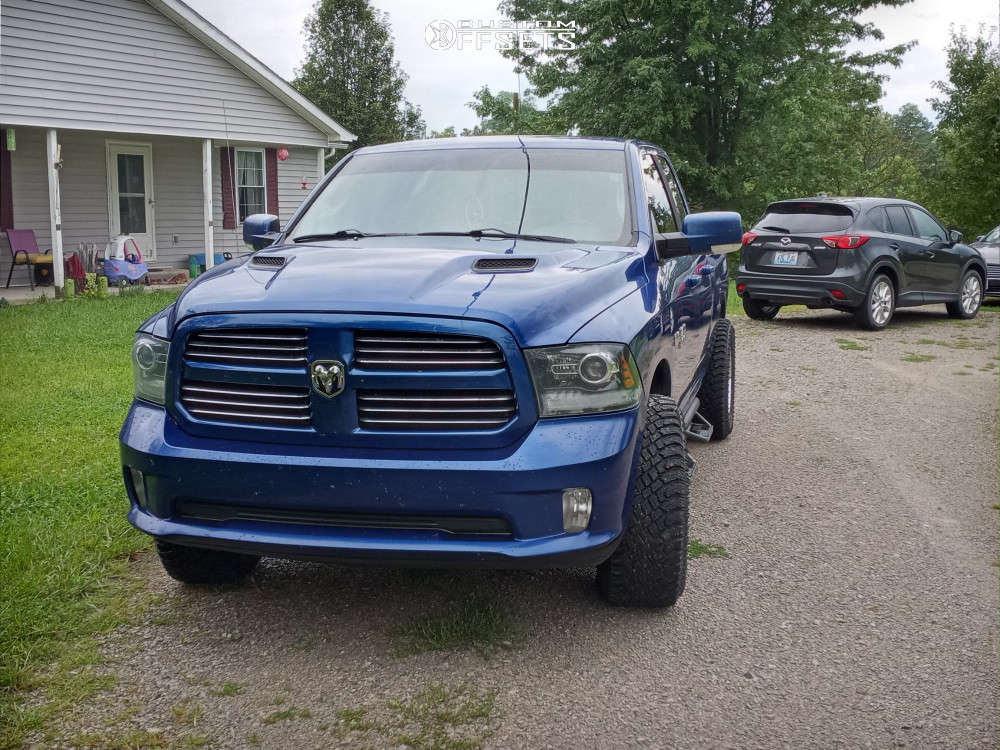 2014 Ram 1500 with 20x10 -25 Vision Razor and 33/12.5R20 Atturo Trail ...