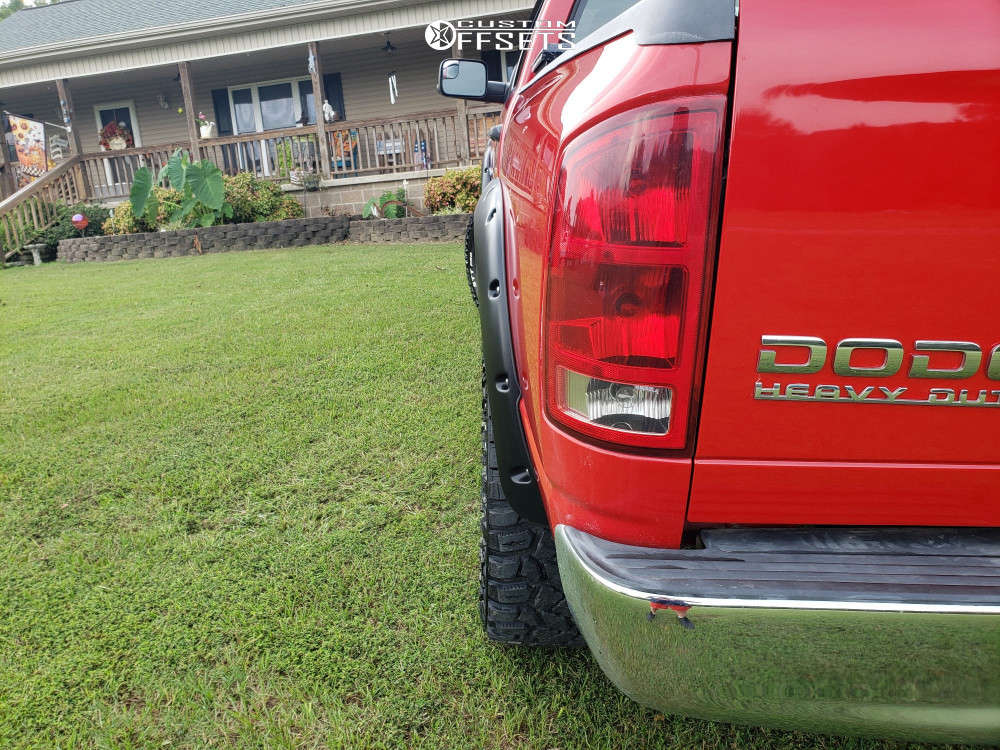 2004 Dodge Ram 2500 with 18x9 20 Raceline Raptor and 325/65R18 Cooper ...