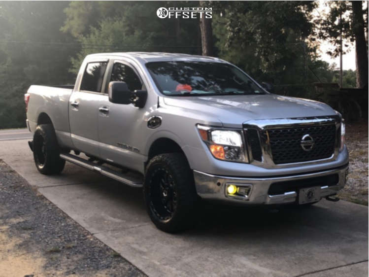 2017 Nissan Titan XD with 20x10 -25 TIS 544BM and 33/12.5R20 Nitto