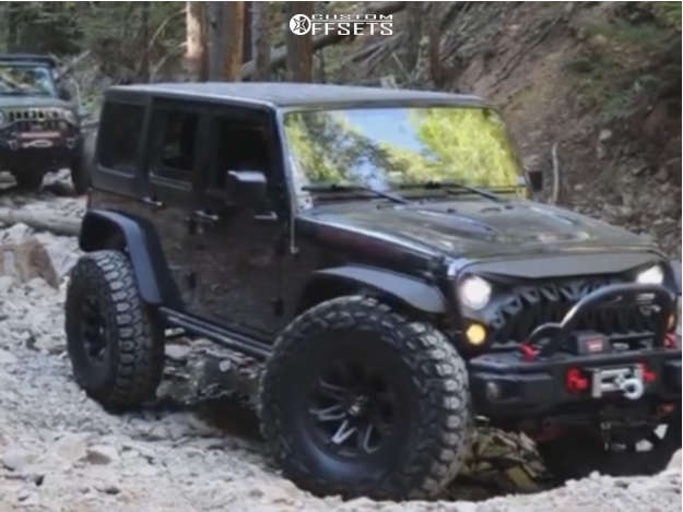 2017 Jeep Wrangler JK with 17x9 -12 Ballistic Jester and 40/  Gladiator Xcomp Mt and Suspension Lift 4