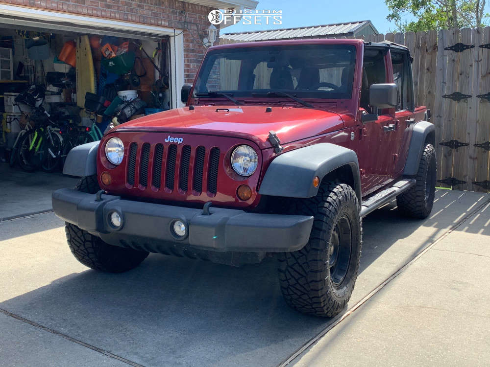 2012 Jeep Wrangler with 16x8 12 Pro Comp XTREME and 305/70R16 