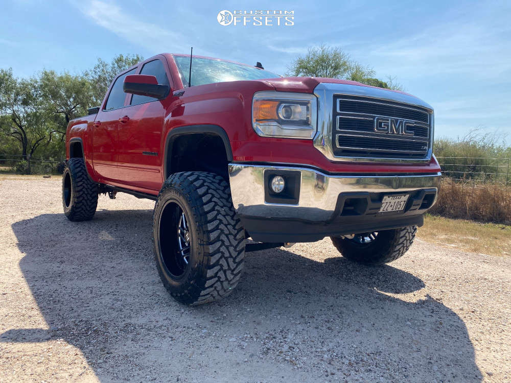 2015 GMC Sierra 1500 with 20x12 55 Hostile Jigsaw and 37/12.5R20 Toyo
