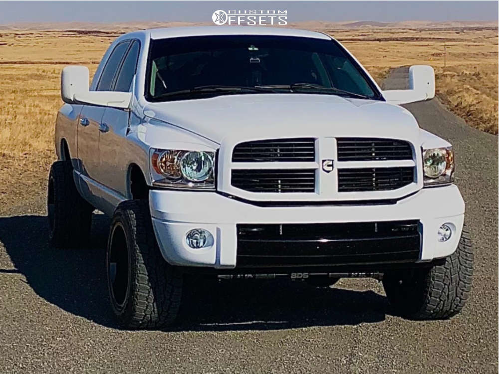 2007 Dodge Ram 3500 with 20x12 -44 Hostile Fury and 295