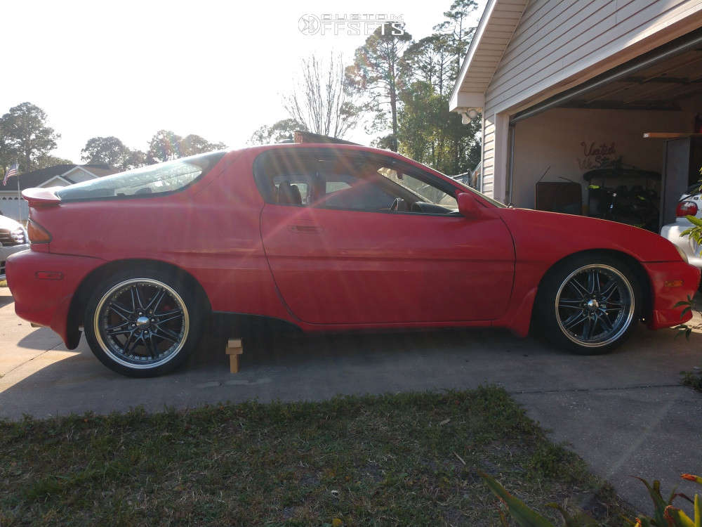 1993 Mazda MX-3 with 17x7 41 Tenzo R Shu-4 and 205/40R17 Kumho