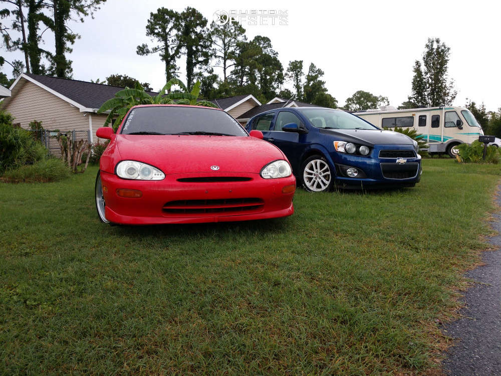 1993 Mazda MX-3 with 17x7 41 Tenzo R Shu-4 and 205/40R17 Kumho