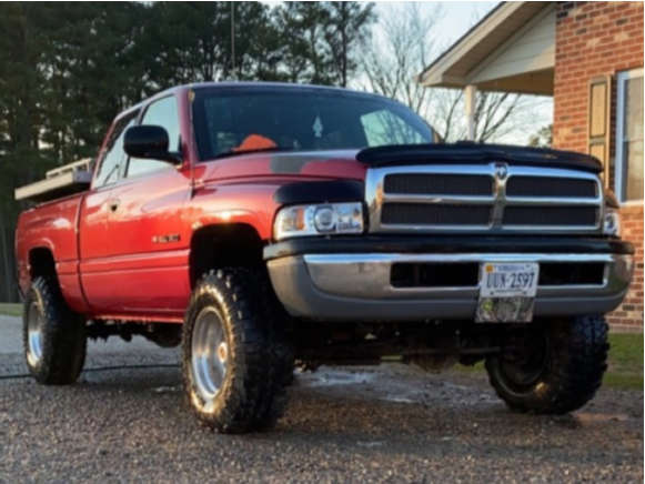 1998 Dodge Ram 1500 with 16.5x10 -0 Weld Racing Road Hawks and 33/12 ...