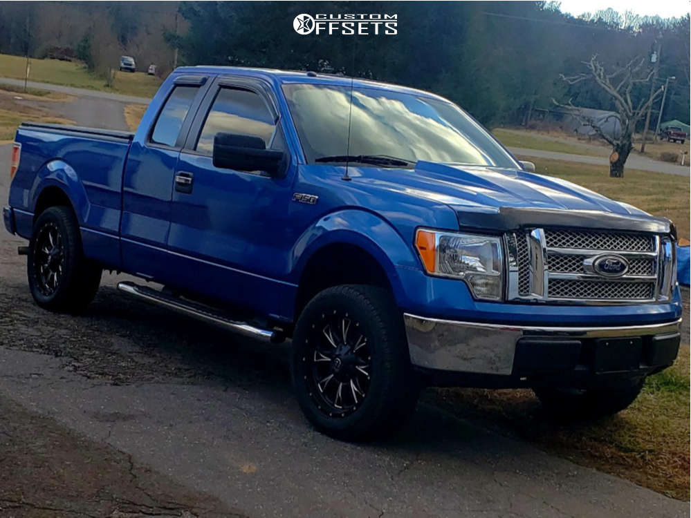 2009 Ford F150 with 20x9 20 Fuel Throttle and 275/55R20 Yokohama