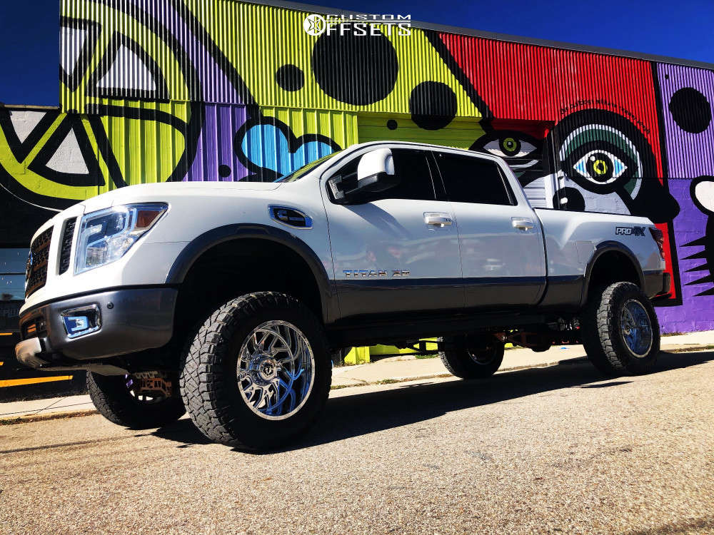 2018 Nissan Titan XD with 20x12 -44 TIS 544C and 35/13.5R20 Nitto