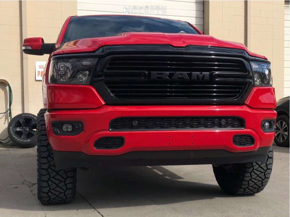 2020 Ram 1500 with 20x10 19 Fuel Assault D246 and 35/12.5R20 Nitto