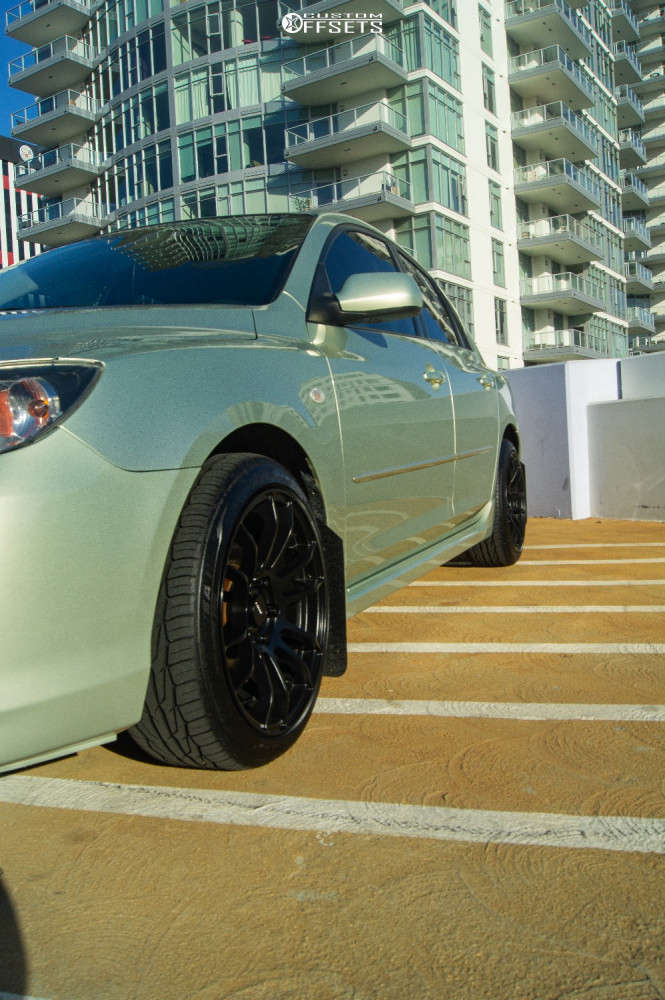 2009 Mazda 3 with 17x8 35 AVID1 AV20 and 205/40R17 Toyo Tires