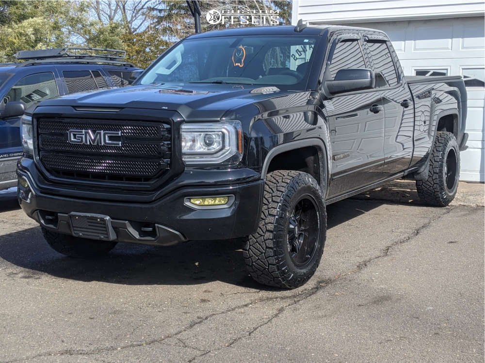 2017 GMC Sierra 1500 with 18x10 24 Moto Metal Mo970 and 33/12.5R18