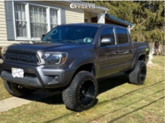 2014 Toyota Tacoma with 20x12 -44 XD XD820 Grenade and 33/12.5R20