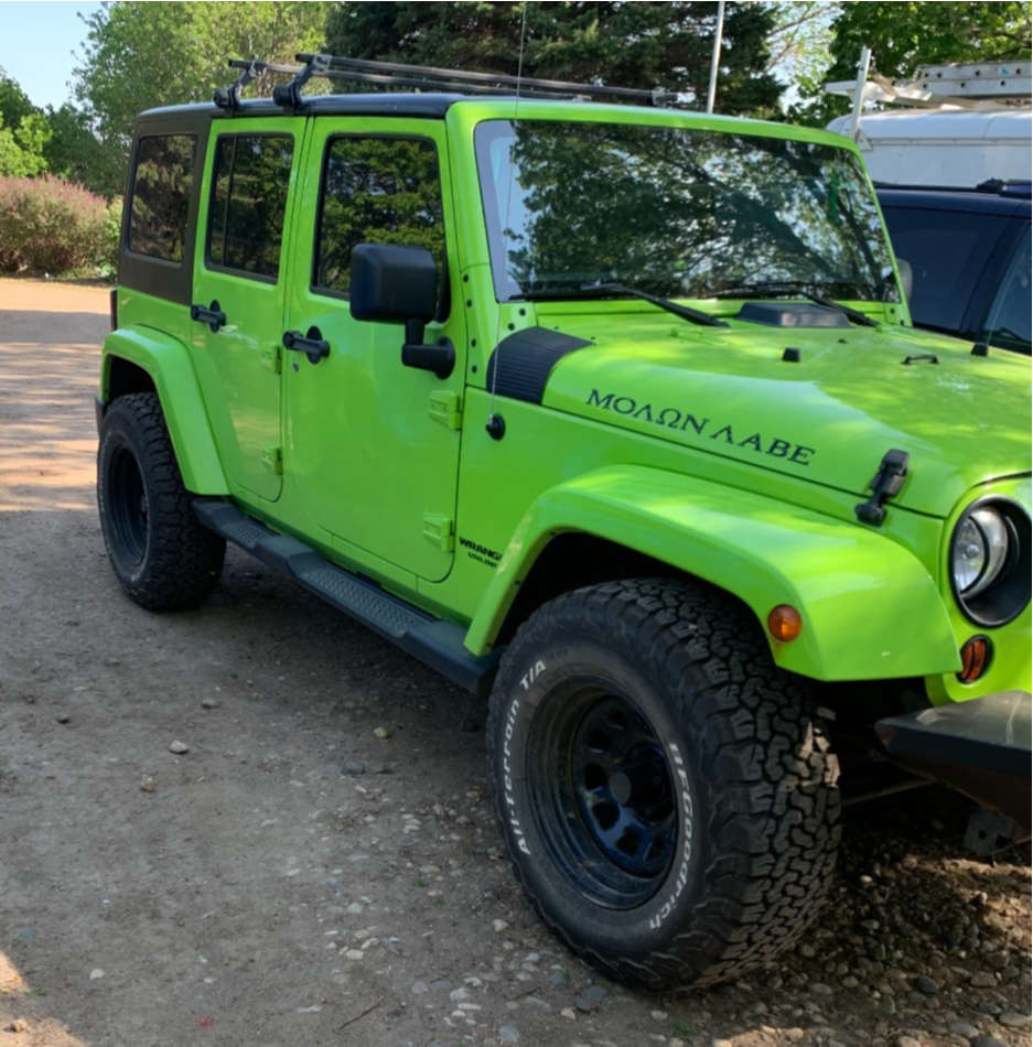 2012 Jeep Wrangler with 17x9 19 Pro Comp Series 51 and 33/12.5R17