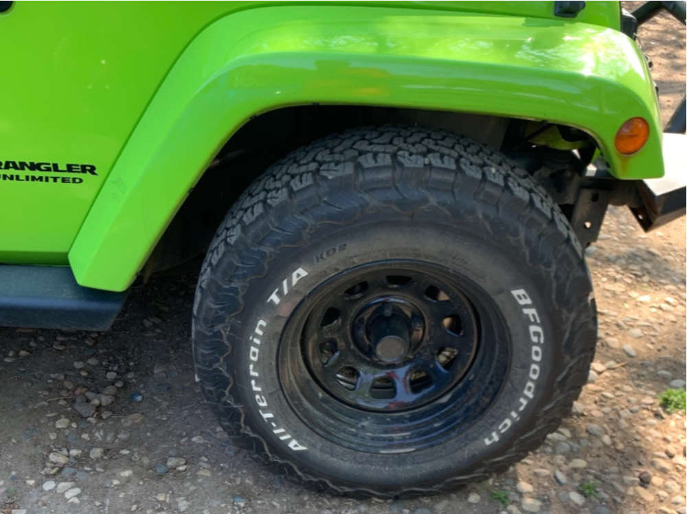 2012 Jeep Wrangler with 17x9 19 Pro Comp Series 51 and 33/12.5R17