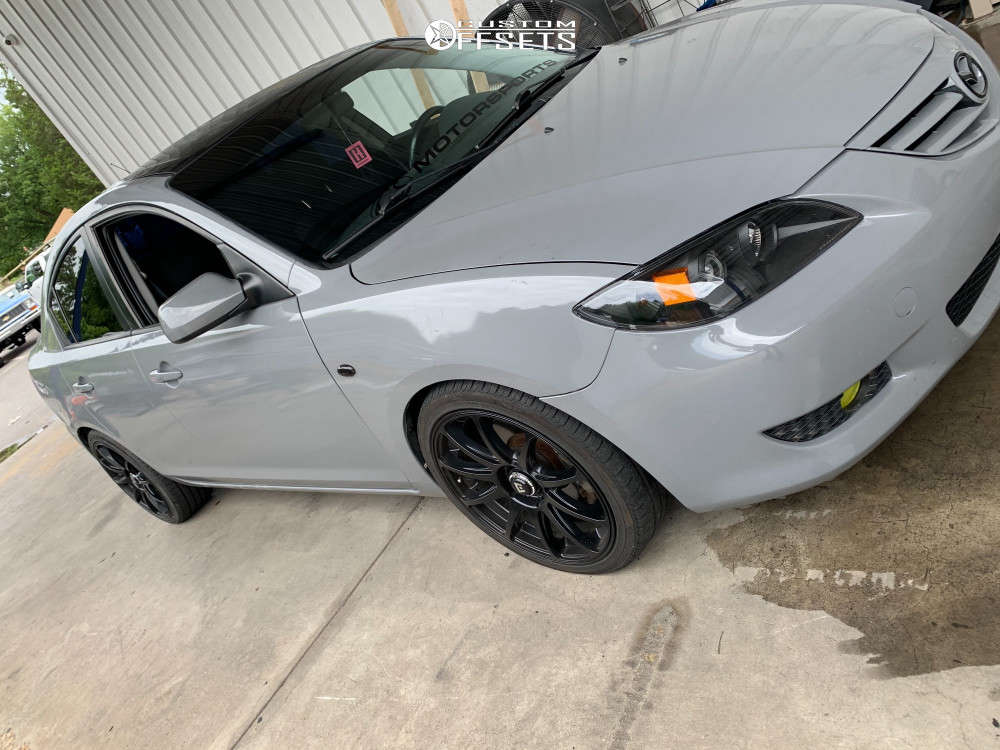 2006 Mazda 3 with 18x8 38 Motegi Mr127 and 225/40R18 Ironman Imove