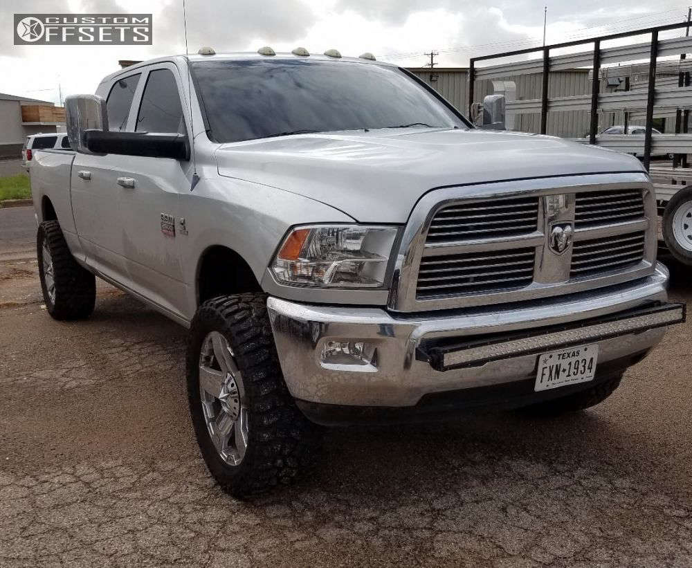 2011 Ram 2500 with 22x9.5 12 XD XD775 and 325/50R22 Cooper Discoverer