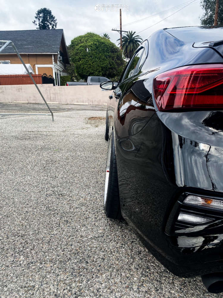 2020 Kia Forte with 18x8.5 35 Aodhan Ah02 and 215/40R18 Kumho All