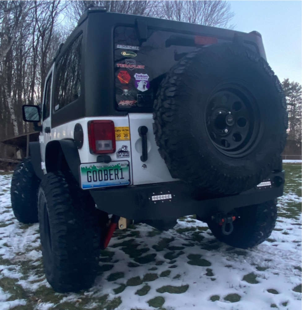 2013 Jeep Wrangler JK with 17x9 19 Pro Comp Series 97 and 37/12.5R17