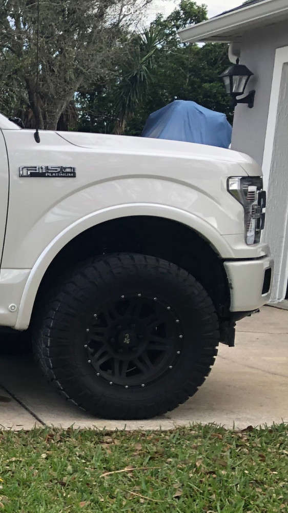 2018 Ford F150 with 17x9 6 Pro Comp Series 05 and 33/12.5R17 Nitto