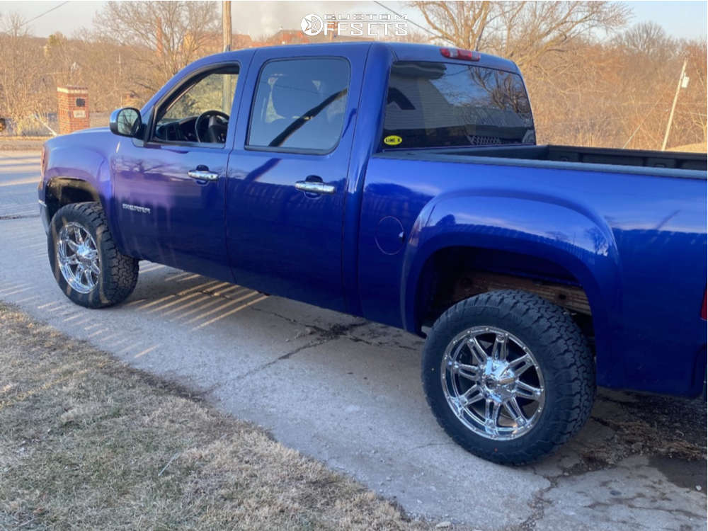 2010 GMC Sierra 1500 with 20x9 Fuel Hostage and 33/12.5R20 AMP Pro At and Leveling Kit Custom