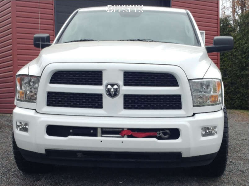 2014 Ram 1500 with 20x10 13 Fast Wheels Grinder and 305/55R20 Falken
