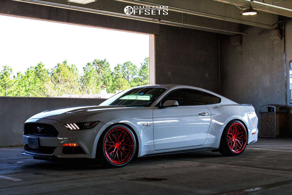 2017 Ford Mustang with 20x9 35 XXR 571 and 265/35R20 Falken Azenis