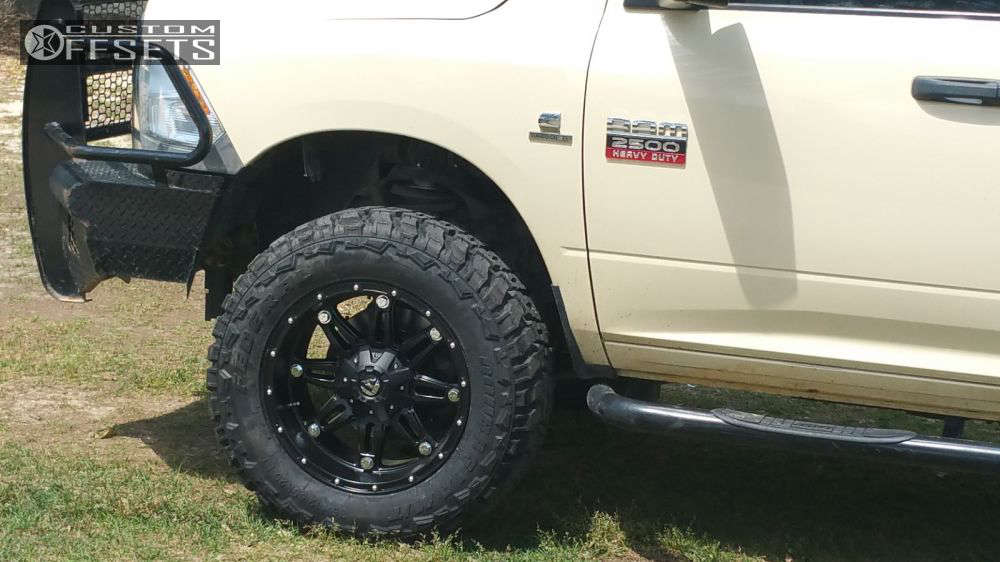 2011 Ram 2500 with 20x10 24 Fuel Hostage and 35/12.5R20 Federal