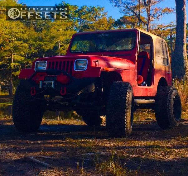 1990 Jeep Wrangler with 20x14 76 Fuel Hostage and 35/12.5R20 Atturo