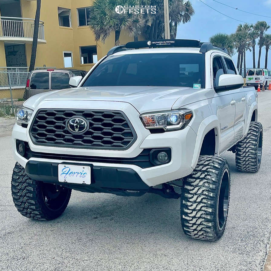2018 Toyota Tacoma with 22x12 -44 TIS 547BM and 33/12.5R22 Federal