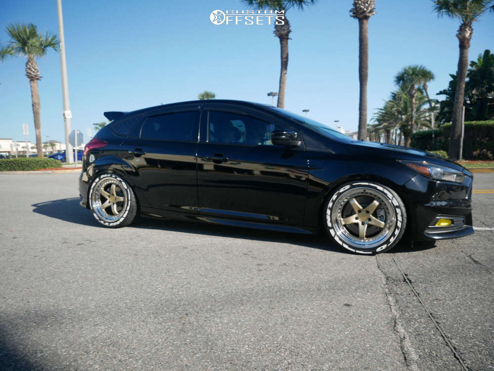 2016 Ford Focus with 18x8.5 35 XXR 565 and 245/40R18 Nitto Nt555