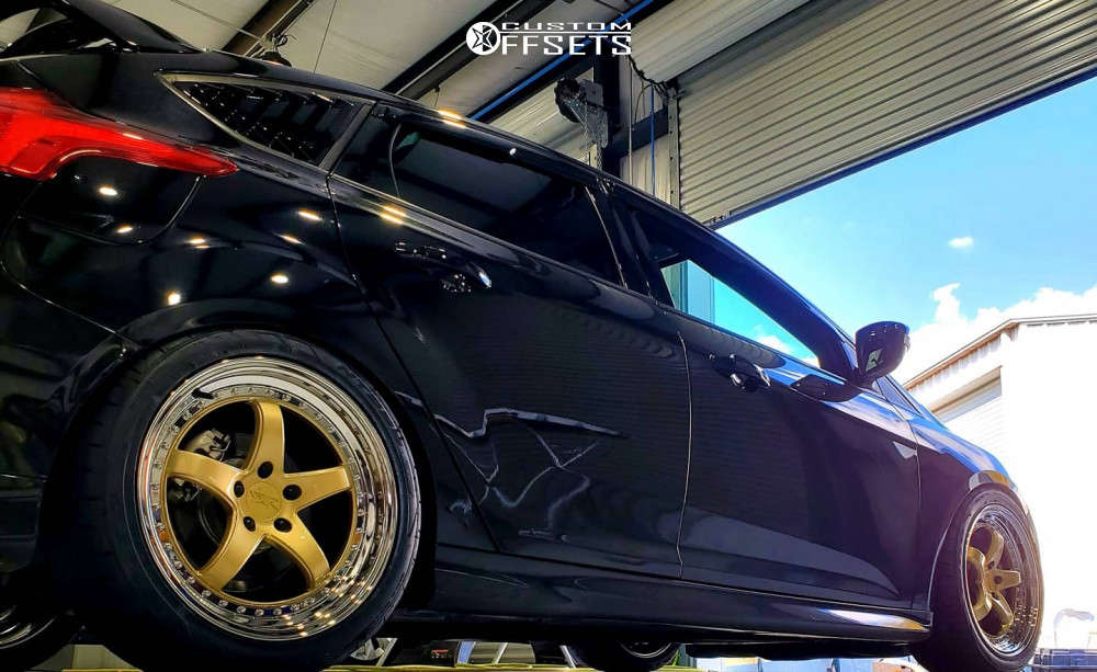 2016 Ford Focus with 18x8.5 35 XXR 565 and 245/40R18 Nitto Nt555