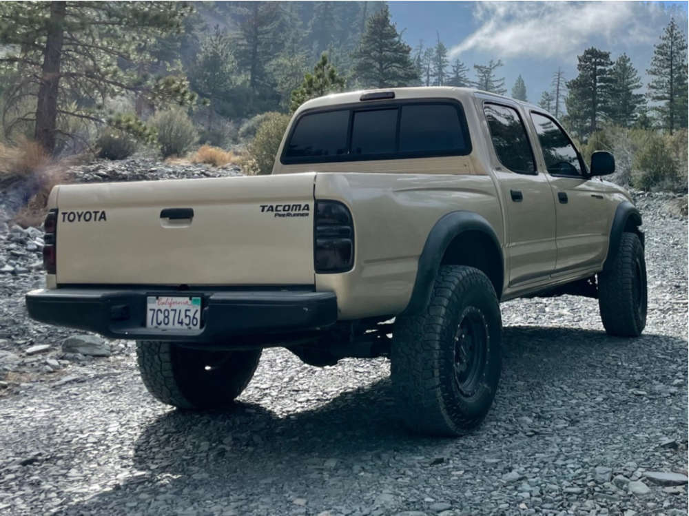 2003 Toyota Tacoma with 16x8 0 Raceline Defender and 33/11.5R16