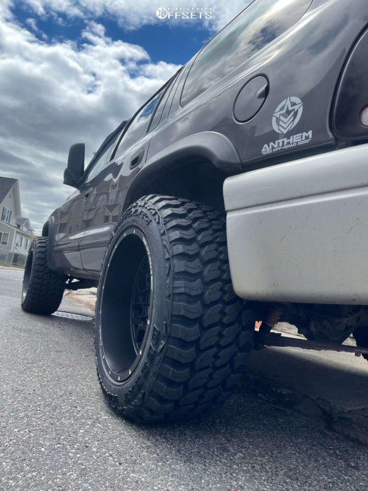 2002 Dodge Durango with 20x12 -44 Anthem Off-Road Avenger and 33/12 ...