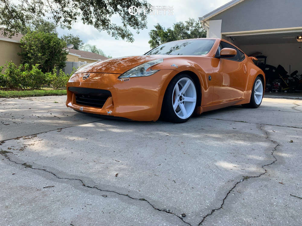 2010 Nissan 370Z with 18x9 25 JNC Jnc026 and 215/40R18