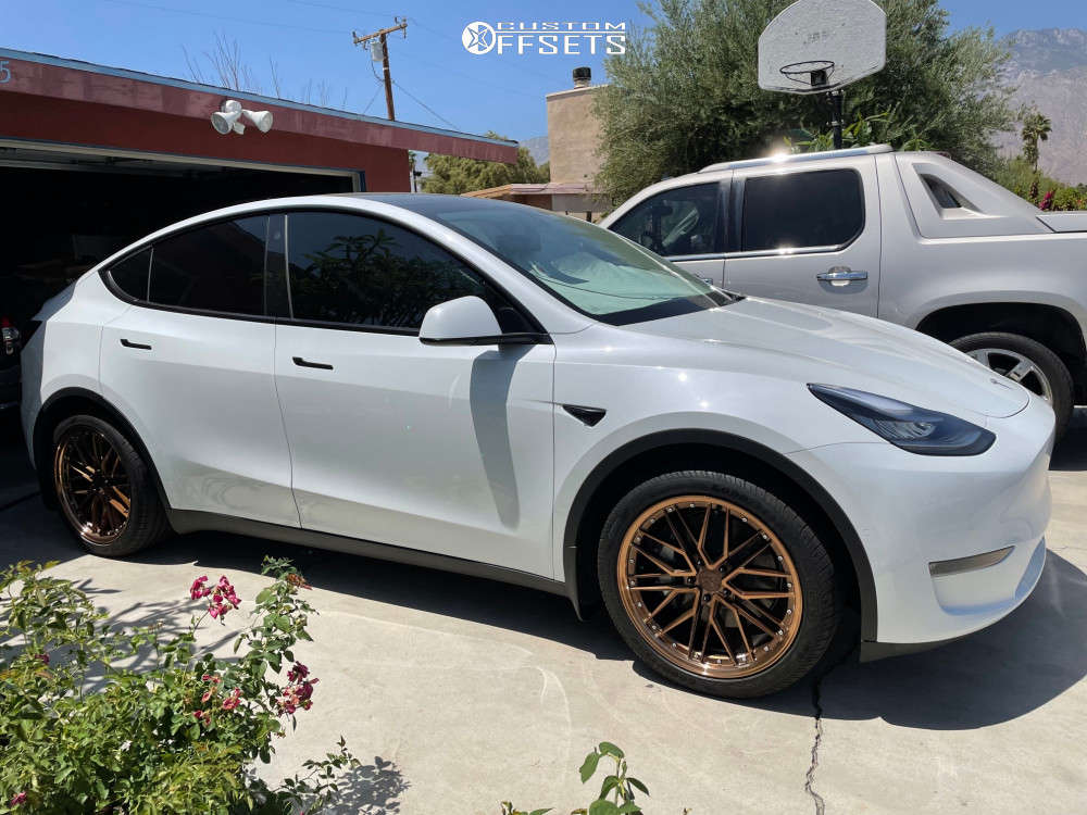 2020 Tesla Y with 20x9 35 XXR 571 and 255/40R20 Goodyear All