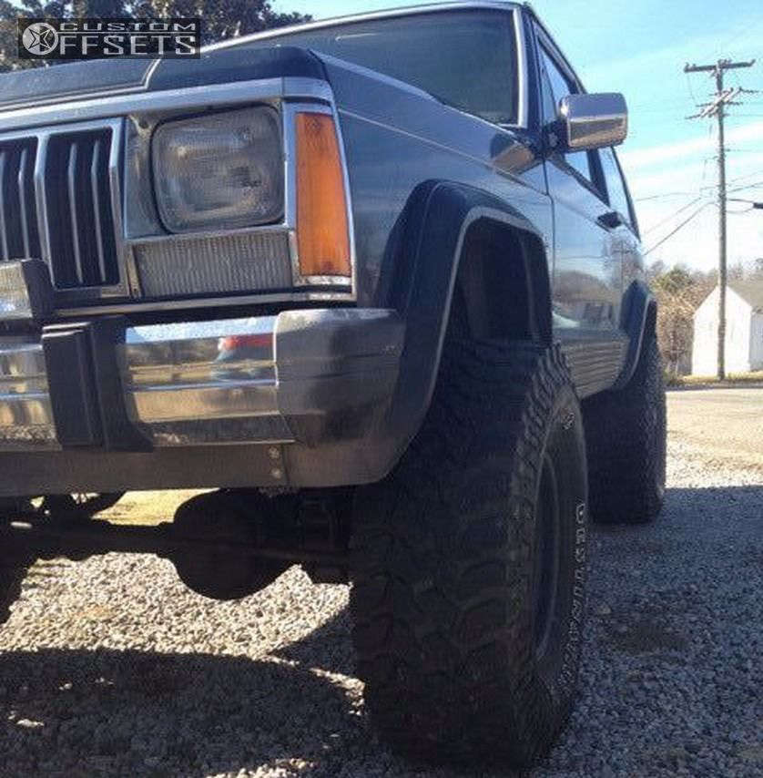 1990 Jeep Cherokee with 15x10 38 Black Rock 942 Series Type D and 33/