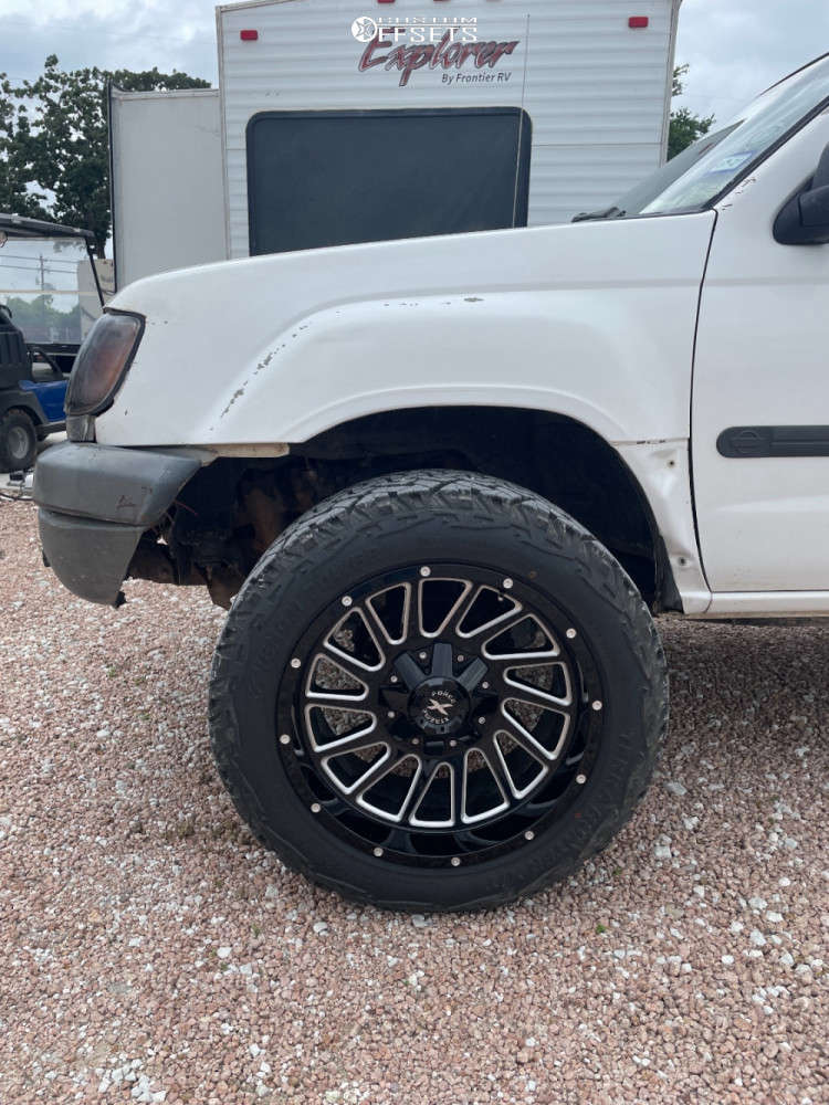 2000 Nissan Xterra with 20x10 22 Extreme Offset XF Twist and 31/10