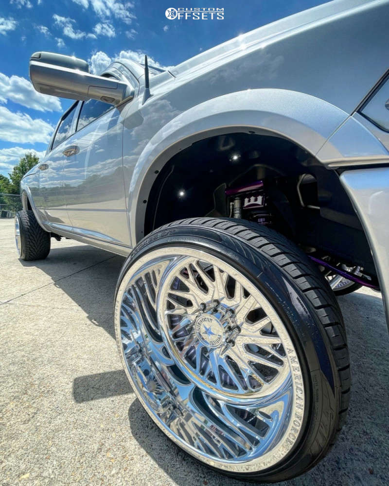 2015 Ram 2500 with 24x14 73 American Force Nova Ss and 305/35R24 Toyo