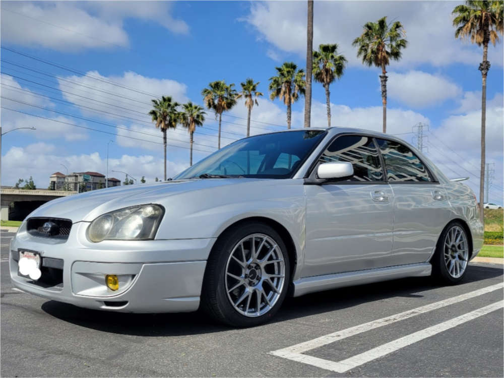 2005 Subaru Impreza with 17x8 45 Enkei Tm7 and 215/45R17