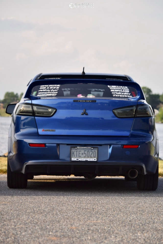 2012 Mitsubishi Lancer with 17x7.5 40 Voxx Riva and 225