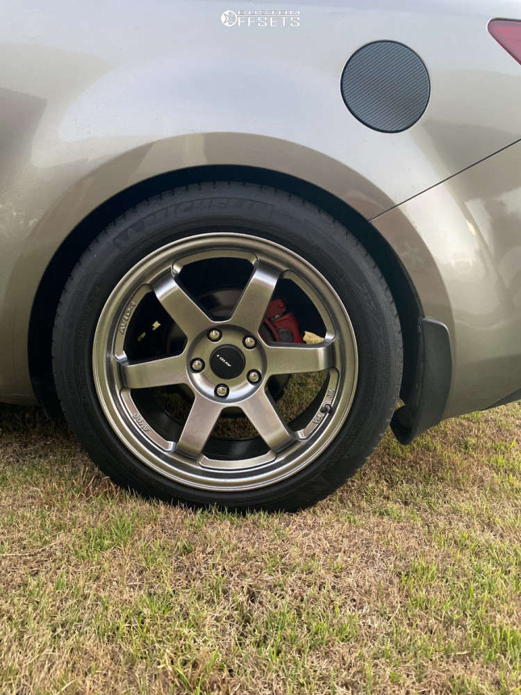 2011 Kia Forte Koup with 17x8 35 AVID1 AV6 and 215/50R17 Accelera All