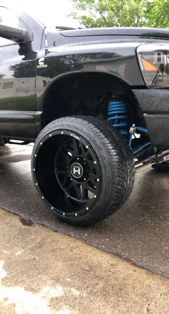 2007 Dodge Ram 2500 with 22x14 76 Hostile Sprocket and 305/40R22