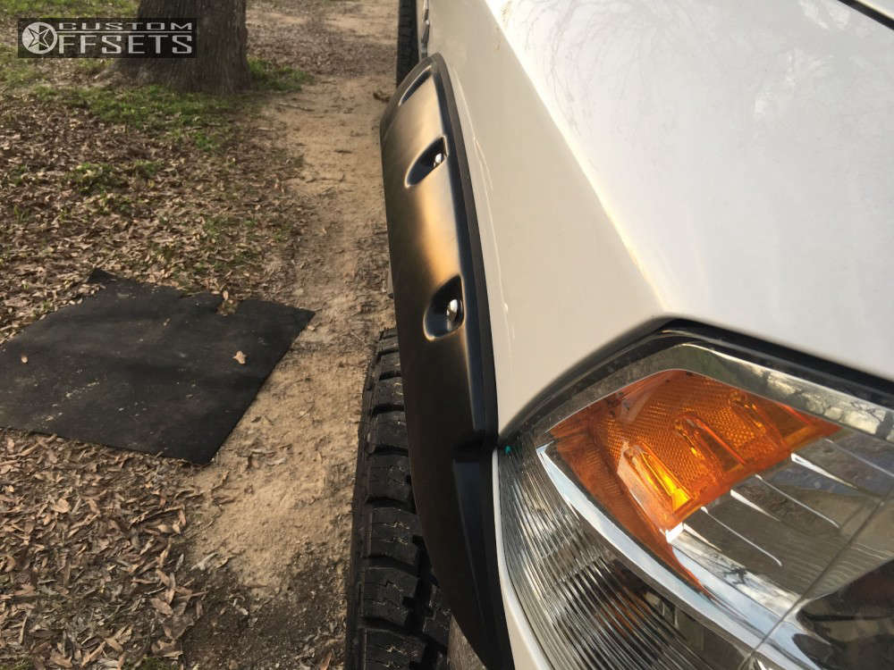 2016 Ram 2500 with 18x9 -12 Axe Offroad 79 and 305/60R18 Nitto Terra ...