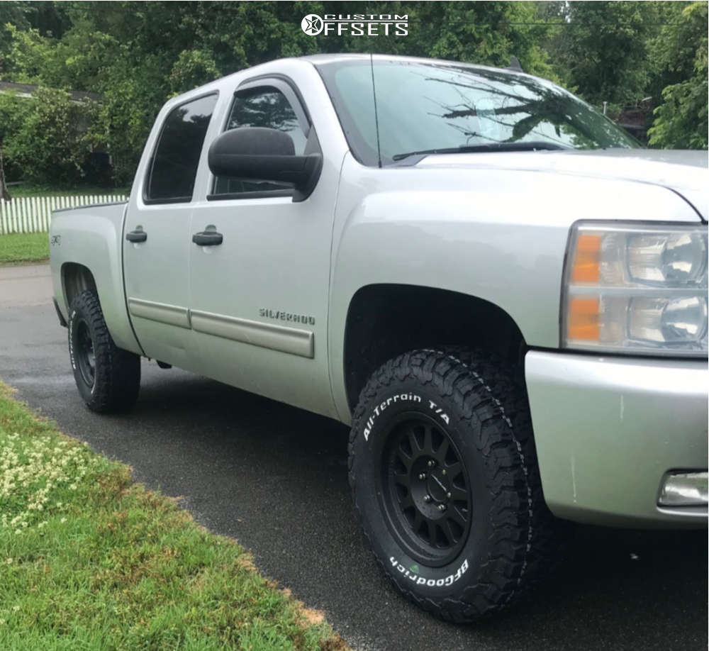 2011 Chevrolet Silverado 1500 with 17x8.5 Method Mr704 and 285/70R17 ...