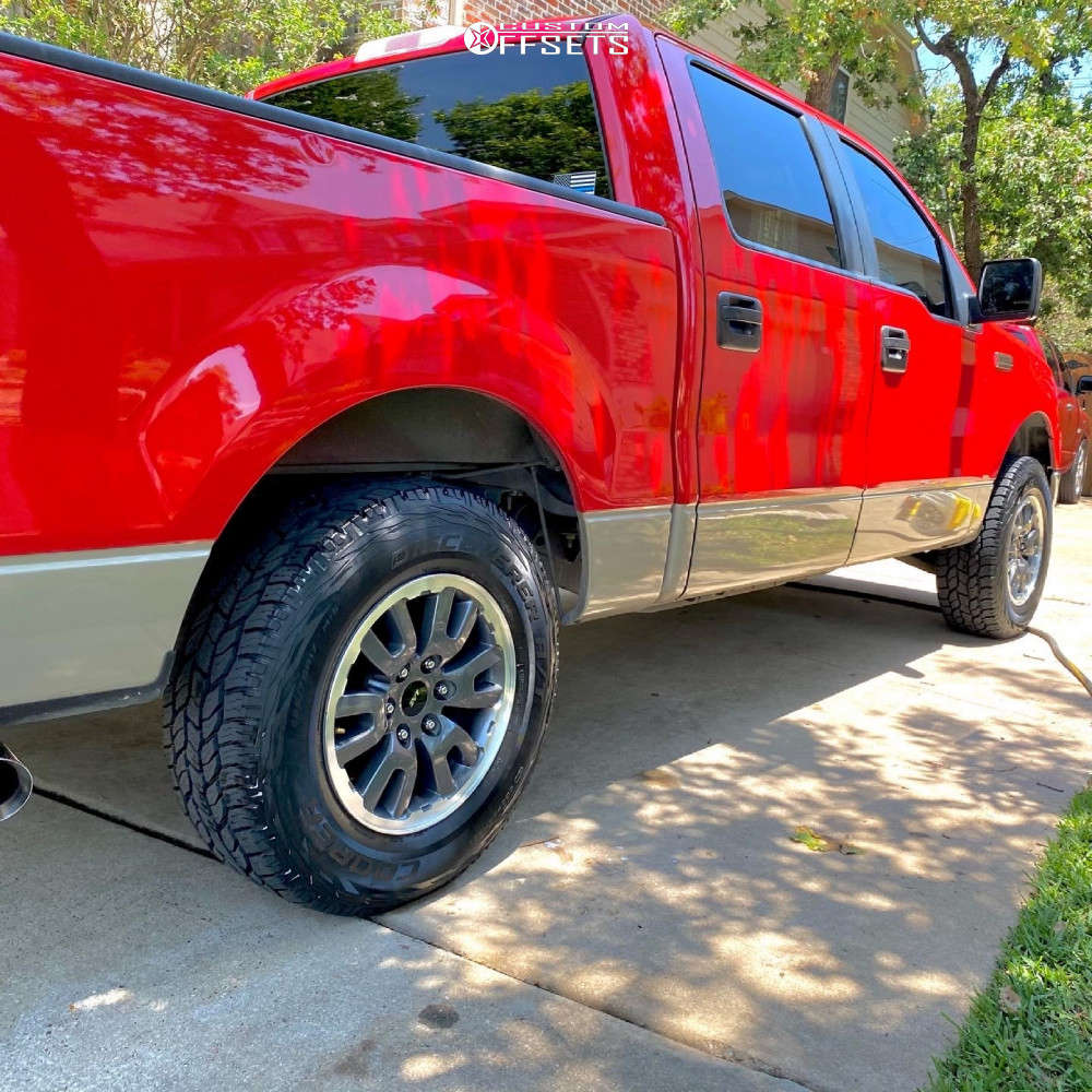 2008 Ford F150 with 17x9.5 OEM Wheels Raptor Rims and 32/70R17 Cooper
