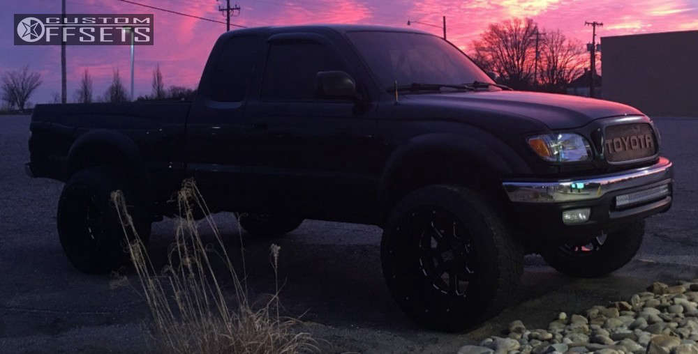 2003 Toyota with 20x14 76 XD Xd825 and 285/55R20 Nitto Terra